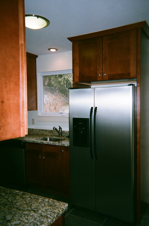 New Kitchen cabinets, window, granite countertops, refrigerator surround, stainless steel sink and faucet. Rancho Bernardo Poway Scripps Ranch Rancho Santa Fe Fairbanks Ranch