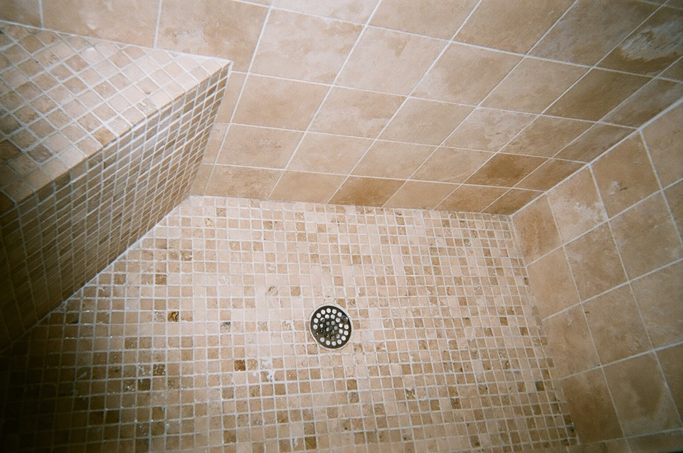 Walk in Shower. Natural stone walls and floor. Seating and niche. Rancho Bernardo Poway Scripps Ranch Rancho Santa Fe Fairbanks Ranch